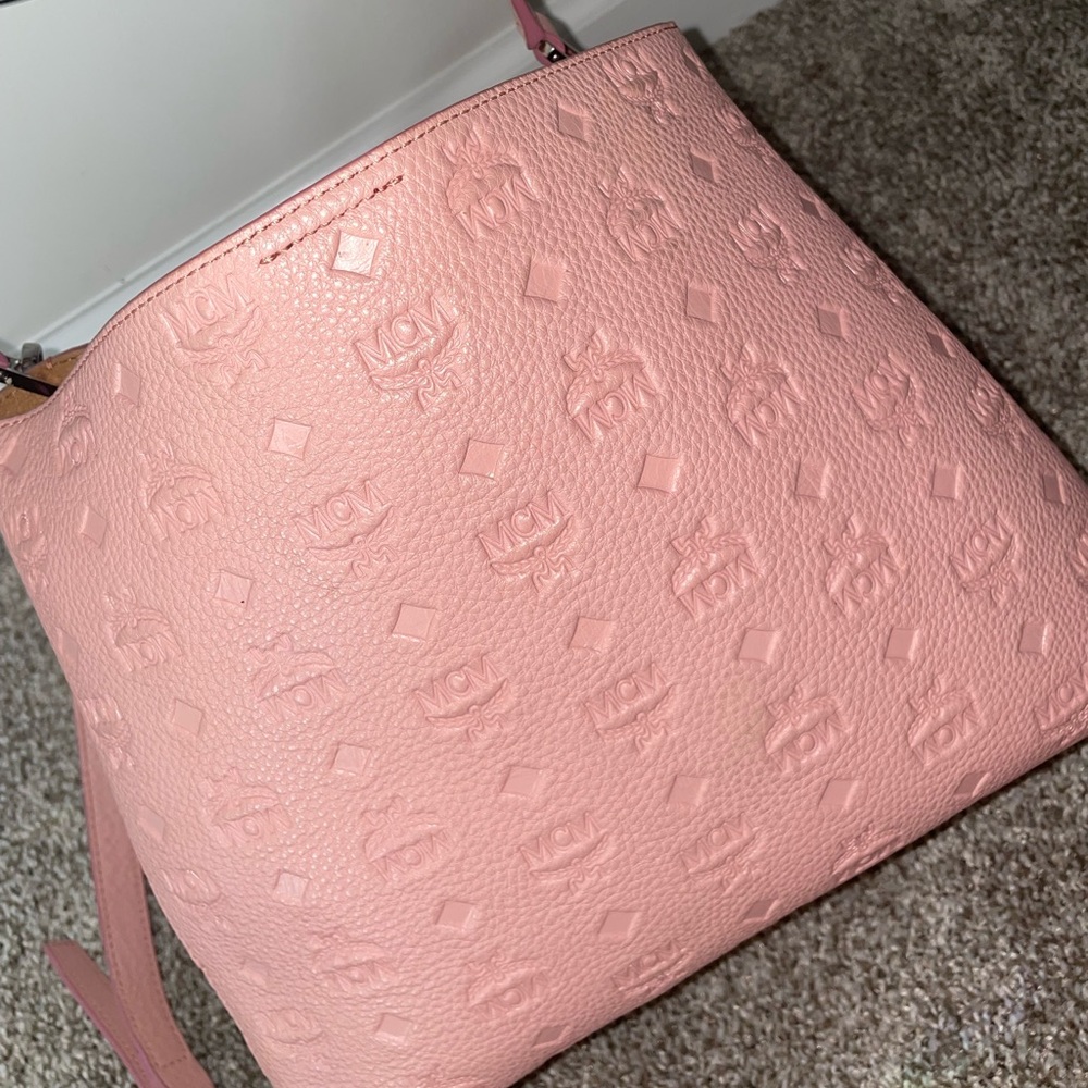 Pink MCM bag.